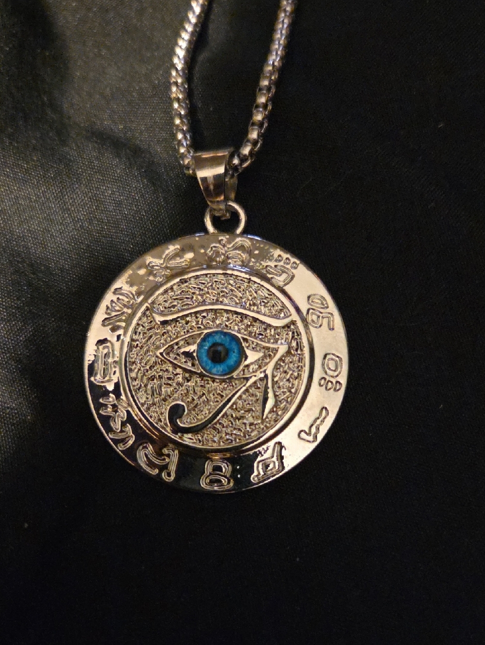 Silver Eye of Horus Pendant Necklace with Blue Accent